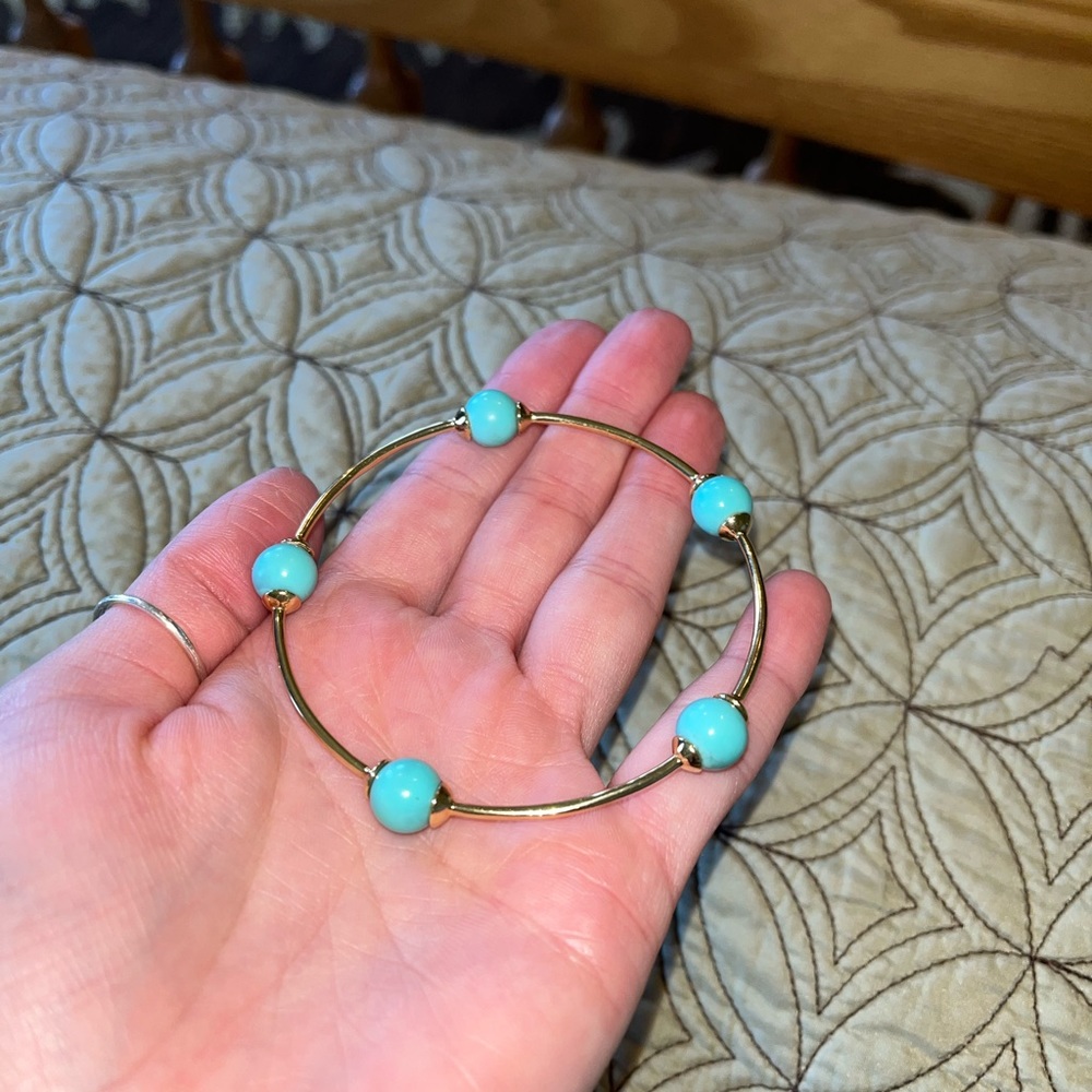 IPPOLITA 18K gold bracelet with turquoise colored stones.